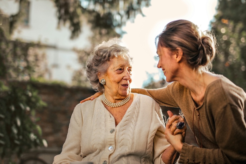 Two people discussing planned gift giving