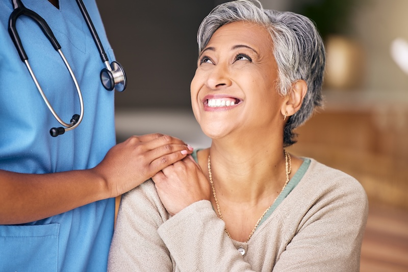 Grateful patient looking at healthcare professional